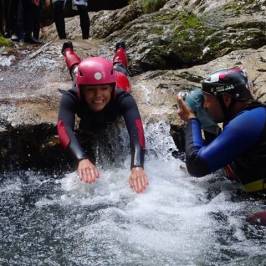 a person in a raft on the water