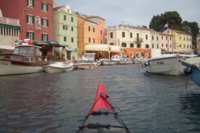 a small boat in a body of water